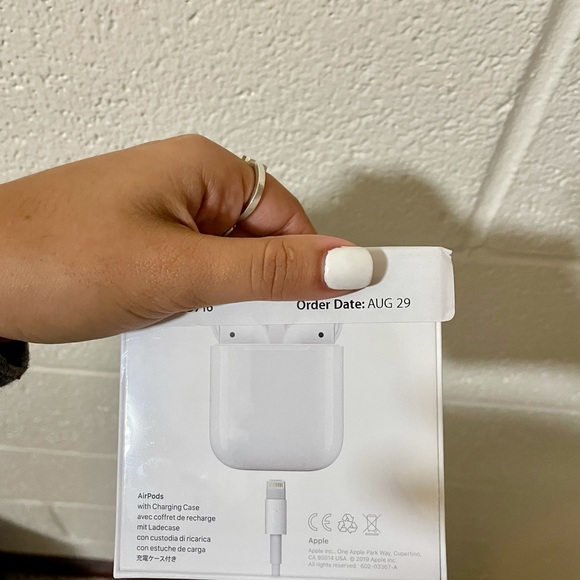 BRAND NEW APPLE AIRPODS WITH CHARGING CASE - Picture 3 of 5
